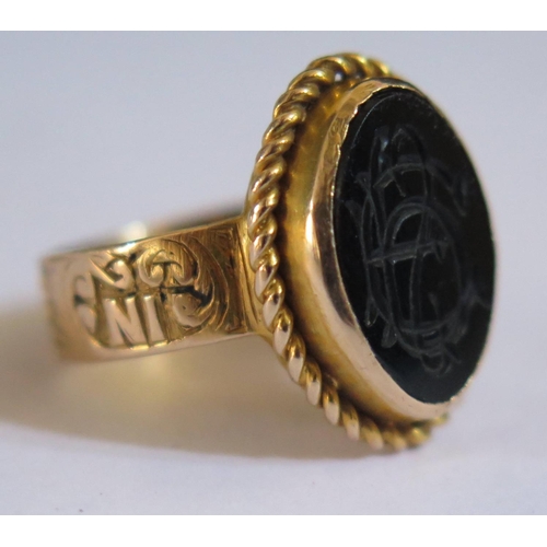 589 - A 9ct Gold Memorial Ring engraved 1924, size F.5, 3.5g