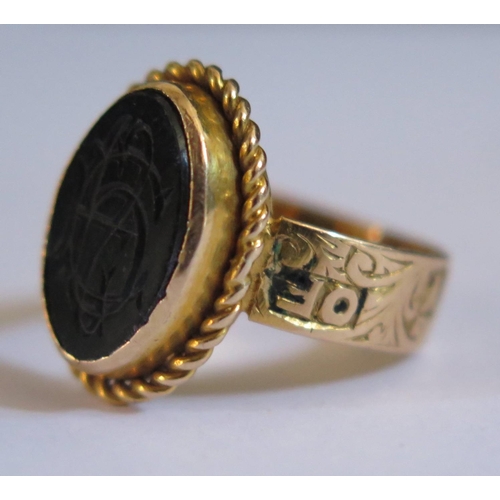 589 - A 9ct Gold Memorial Ring engraved 1924, size F.5, 3.5g