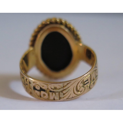 589 - A 9ct Gold Memorial Ring engraved 1924, size F.5, 3.5g