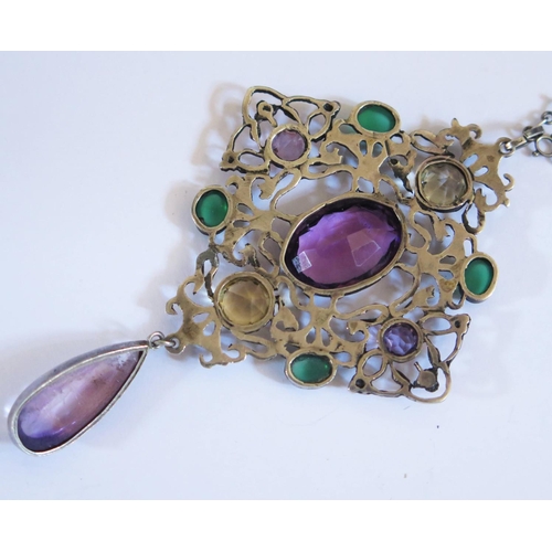 606 - An Arts & Crafts Silver Pendant set with semi-precious stones, c. 7.8x5.2mm, 18.4g