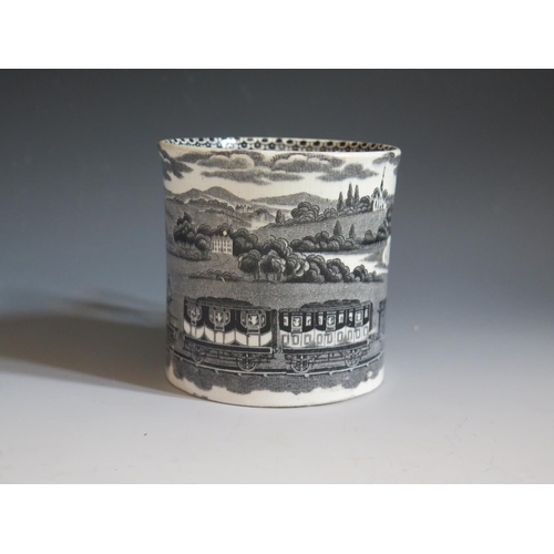 67 - A Nineteenth Century Mug by F.C. & Co.decorated with a black transfer scene of the steam locomotive ... 