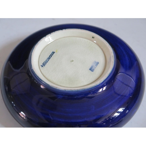 73 - A Morcroft Hibiccus Pattern Blue Cupped Bowl, 16cm diam.