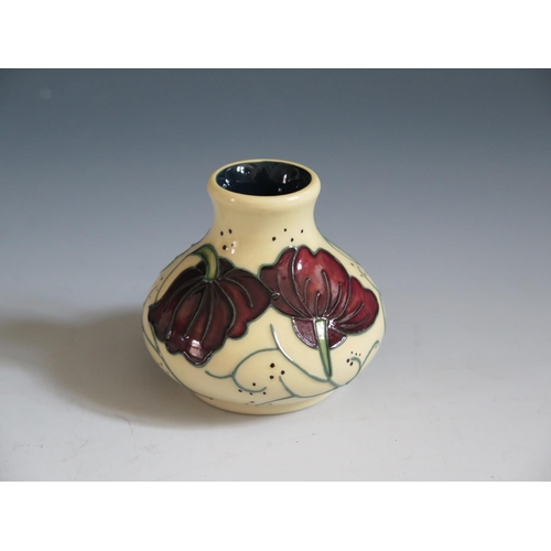 82 - A Modern Moorcroft Chocolate Cosmos Pattern Squat Vase, base marked 2013, 6cm, boxed