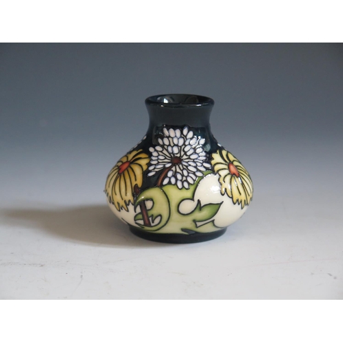 83 - A Modern Moorcroft Daisy May Pattern Small Squat Vase, base marked 2008, 6cm, boxed