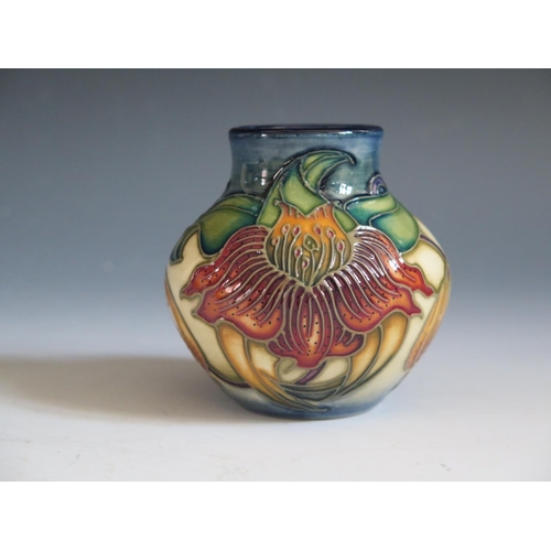 84 - A Modern Moorcroft Anna Lily Patern Vase, base marked 98, boxed