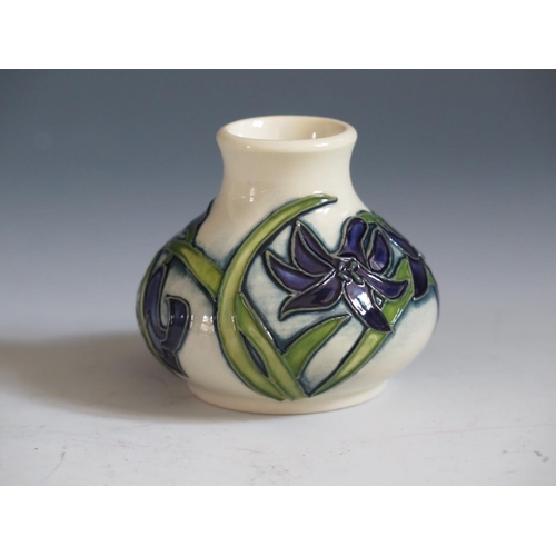 85 - A Modern Moorcroft Periwinkle Pattern Squat Vase, base marked 2014, 6cm, boxed