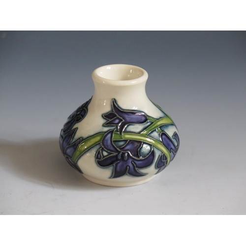 85 - A Modern Moorcroft Periwinkle Pattern Squat Vase, base marked 2014, 6cm, boxed