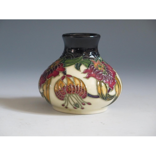 86 - A Modern Moorcroft Anna Lily Pattern Squat Vase, base marked 86, 6cm, boxed