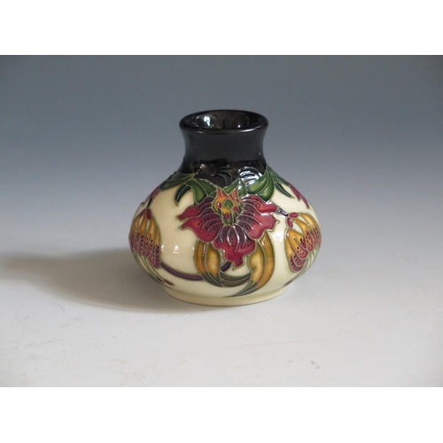 86 - A Modern Moorcroft Anna Lily Pattern Squat Vase, base marked 86, 6cm, boxed