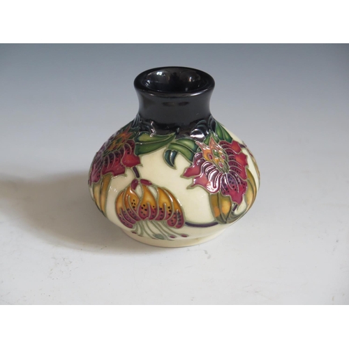 86 - A Modern Moorcroft Anna Lily Pattern Squat Vase, base marked 86, 6cm, boxed