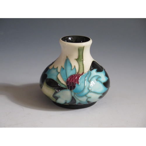 94 - A Modern Moorcroft Floral Pattern Squat Vase, base marked 2006, boxed