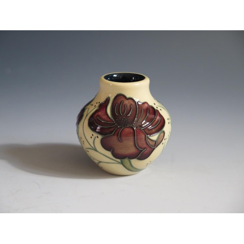 96 - A Modern Moorcroft Chocolate Cosmos Pattern Squat Vase, base marked 2013, 6cm, boxed