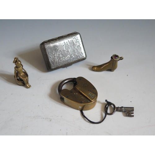 269 - A Bryant & May Wax Vestas Tin decorated with a stage coach, Victorian brass padlock, cigar cutter in... 