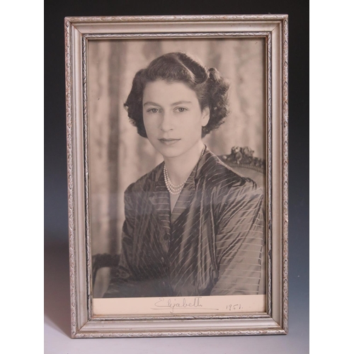 281 - A Signed Half Length Autographed Photograph of Princess Elizabeth (Queen Elizabeth II) in informal t... 