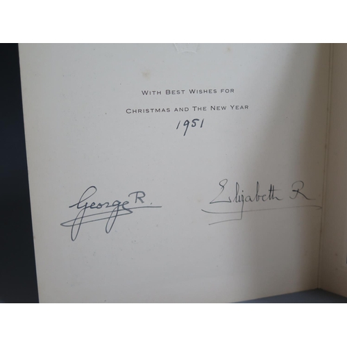 282 - An Official 1951 Royal Christmas Card signed George and Elizabeth and showing a photographic print o... 