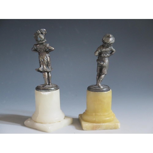 321 - A Pair of Pewter Figurines of a Girl and Boy on alabaster bases, girl 14.5cm high