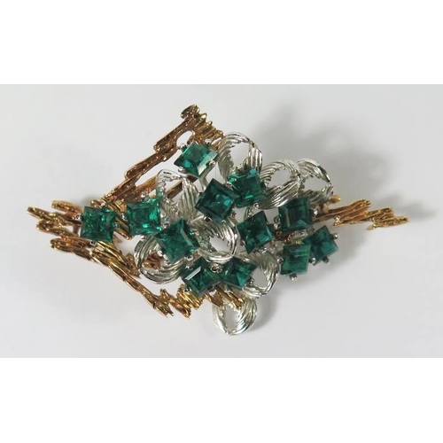 412 - A 14K Yellow and White Gold Brooch set with translucent vivid green stones, 61mm, 15.1g