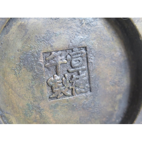 649 - A Chinese Bronze Censer with bird and bat border and mask handles, four character mark to base, 14.5... 