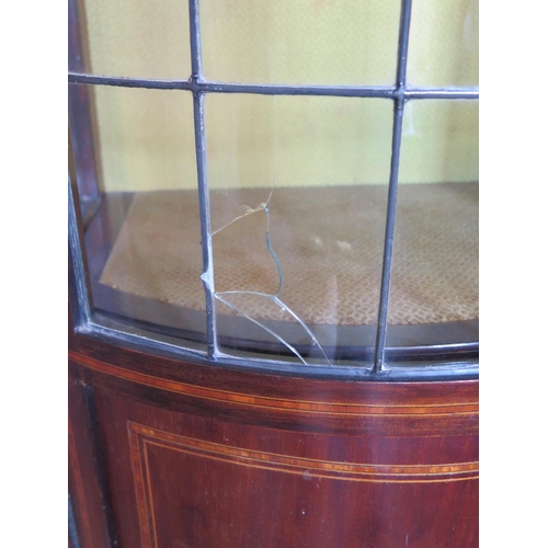 687 - An Edwardian Mahogany and Inlaid Display Cabinet by Henry Barker of Nottingham with twin bow fronted... 