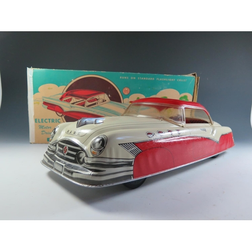 106 - A Very Large Scale Marx Battery Operated Electric Tinplate Convertible Car in Red and Cream in origi... 