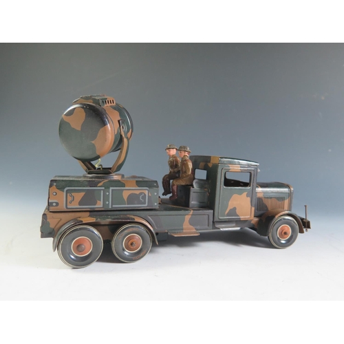 114 - A Scarce Clockwork Tinplate Tippco Tipp & Co. German Searchlight Truck, Motor Works (25cm approx).