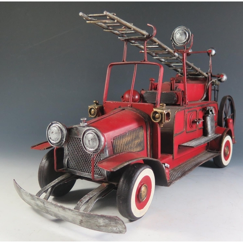 120 - A Modern Replica of an Fire Escape Engine (46cm approx). One sidelight needs reattaching.