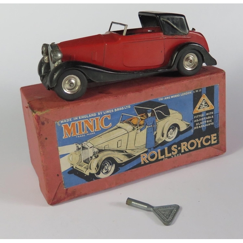 13 - A Scarce Triang Minic 50ME Rolls Royce Sedanca red and black plastic seats. The opening rear boot re... 