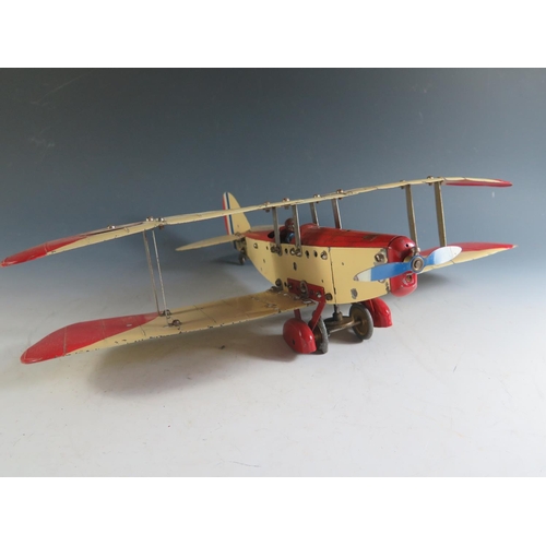 143 - A Scarce 1930's Meccano Aero Constructor Tinplate Clockwork RAF Bi-Plane in Red and Cream, Motor Tir... 