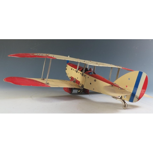 143 - A Scarce 1930's Meccano Aero Constructor Tinplate Clockwork RAF Bi-Plane in Red and Cream, Motor Tir... 