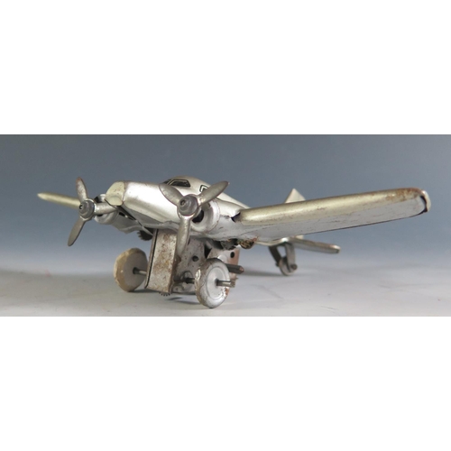 146 - A 1940's German Hammerer & Kuhlwein Tinplate Plane in Silver Livery 