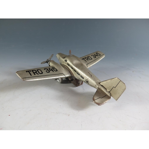 146 - A 1940's German Hammerer & Kuhlwein Tinplate Plane in Silver Livery 