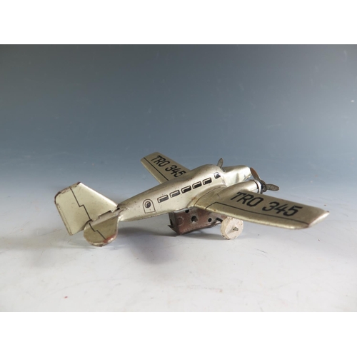 146 - A 1940's German Hammerer & Kuhlwein Tinplate Plane in Silver Livery 