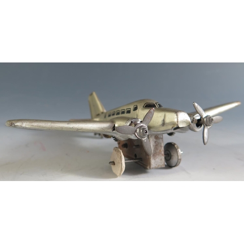 146 - A 1940's German Hammerer & Kuhlwein Tinplate Plane in Silver Livery 