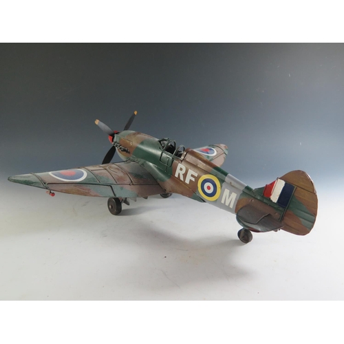 152 - A Modern Tin Toy Replica of a Spitfire (46cm approx wingspan).