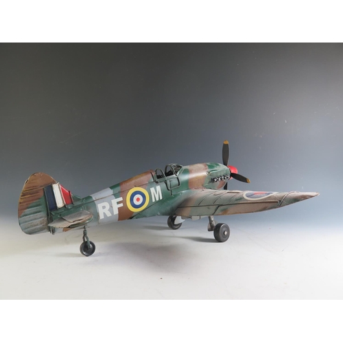 152 - A Modern Tin Toy Replica of a Spitfire (46cm approx wingspan).