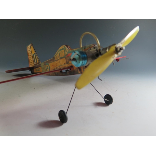 153 - An Unusual Vintage Wooden Airplane with untested engine (46cm approx wingspan).