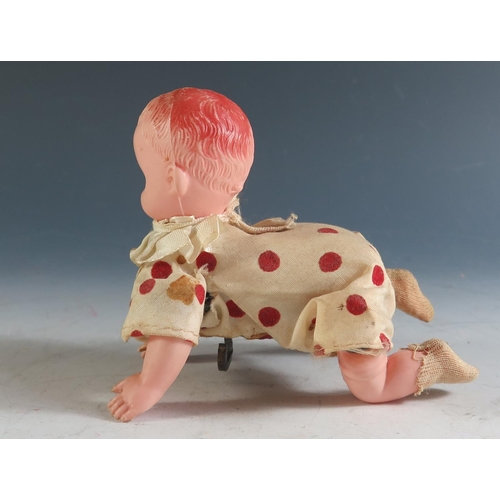 167 - A Clockwork Mutant Crawling Baby, possibly Japanese (12cm approx).