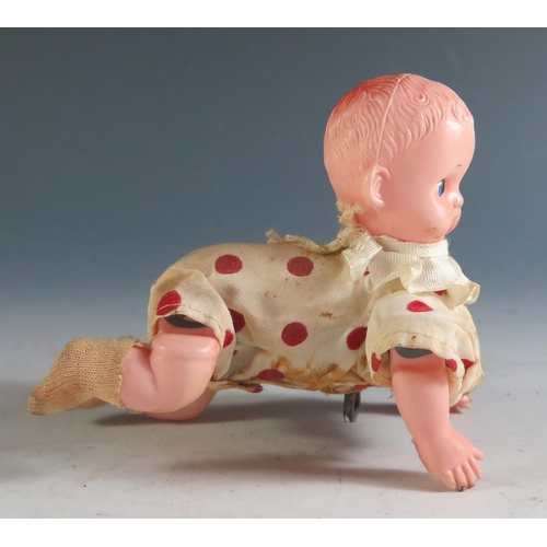 167 - A Clockwork Mutant Crawling Baby, possibly Japanese (12cm approx).