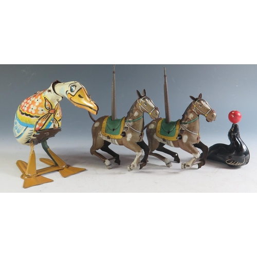 171 - Four Clockwork Tinplate Animals Including Two Japanese made horses and duck and seal both made in En... 