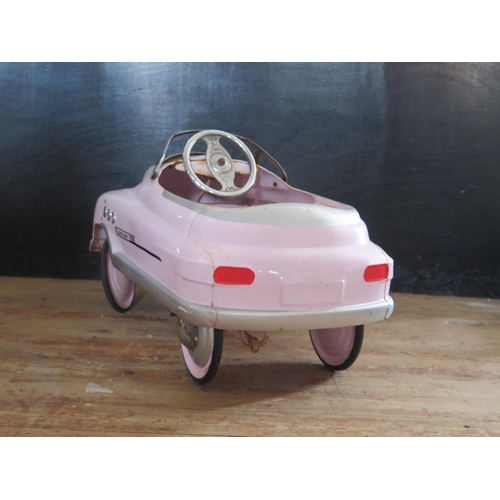 196 - A 1950's Style Metal Super Sports Pedal Car in Pink (100cm approx).