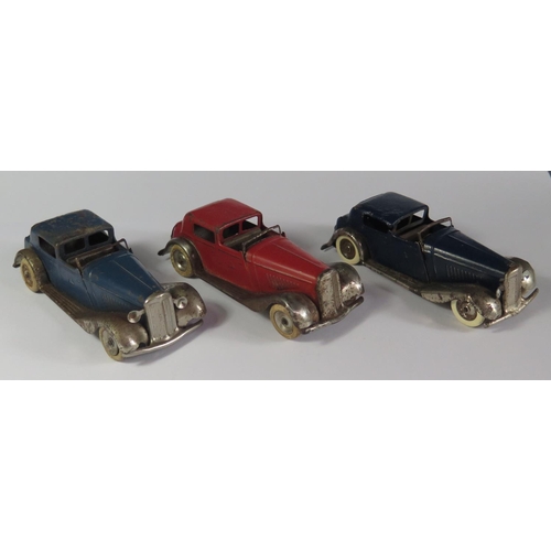 2 - Three Triang Minic 18M Vauxhall Town Coupe Cars in blue and red with chrome. One motor needs attenti... 