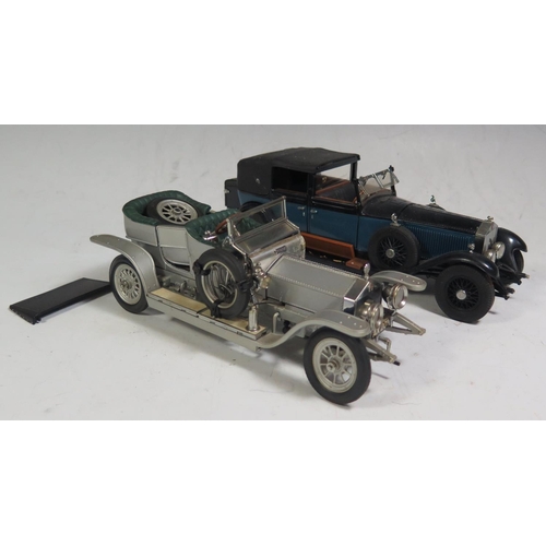 215 - Two Franklin Mint 1:24 Rolls-Royce Models. Both have some damage.