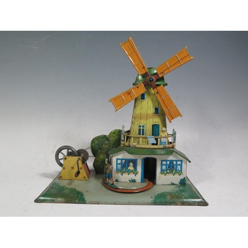 247 - A Scarce Centrimotor (German) Mechanical Tinplate Windmill with Rotating Donkey and Man.