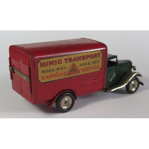 26 - A Triang Minic Clockwork 22M Delivery Van in dark green and red with decals 