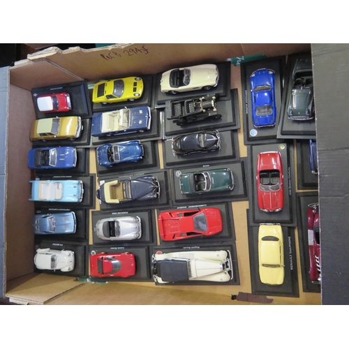 294f - A Collection of 66 Scale Model Cars made by Del Prado on Plinths with Binder and Booklets.