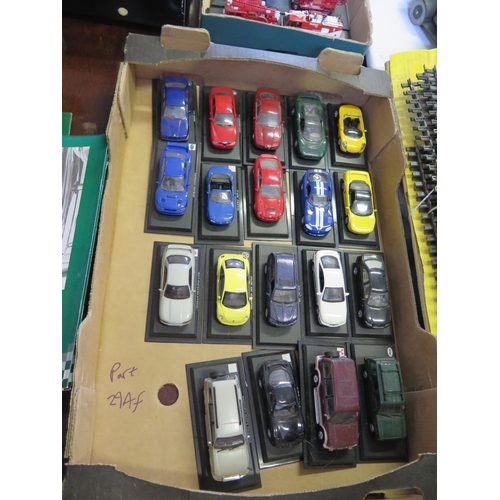 294f - A Collection of 66 Scale Model Cars made by Del Prado on Plinths with Binder and Booklets.