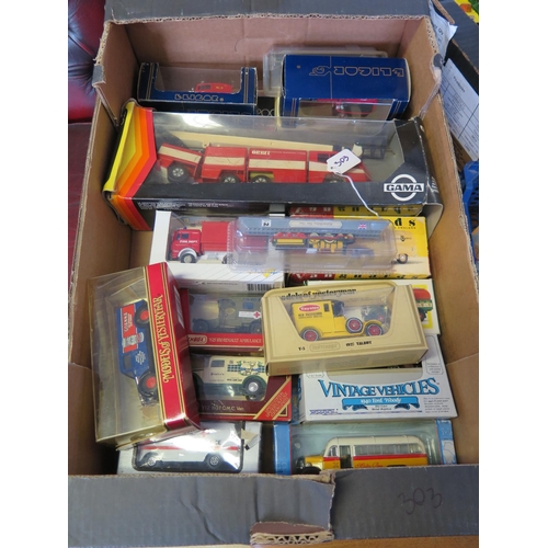 303 - A Collection of Boxed Toy Vehicles including a Gama Vision 2000 Fire Engine, Matchbox etc.