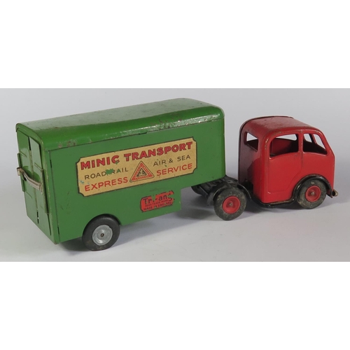 31 - A Triang Minic Clockwork 3M Mechanical Horse and Pantechnicon Trailer in red and green. Motor turns.