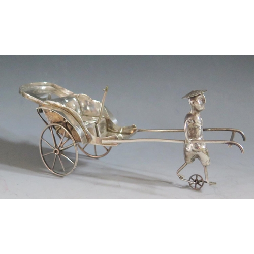 324 - A Chinese Silver Plated Rickshaw Model, 21cm long