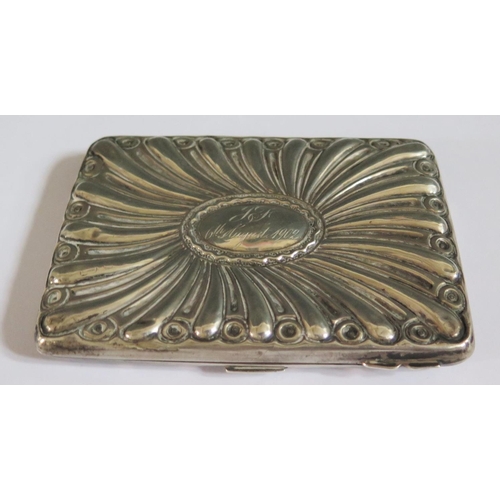 337 - A Silver Card Case fitted with leather compartments for cards and coins, marks rubbed, engraved and ... 